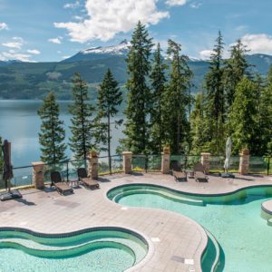 The pools at Halcyon with mountains in the background
