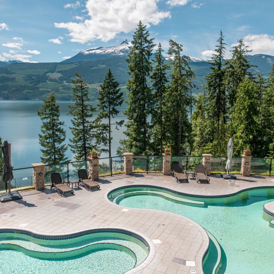 The pools at Halcyon with mountains in the background